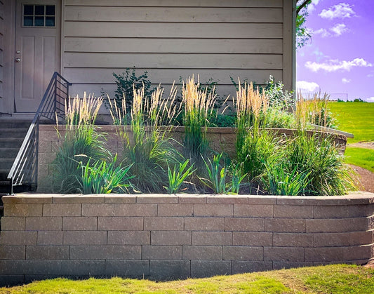 Rebuilt two tier retaining wall using Belgard Diamond Pro Desert Tan in West Bloomington Minneapolis