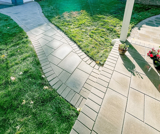 Installing Grand Discovery Allure pavers for patio and walkway in Cedar Lake Minneapolis