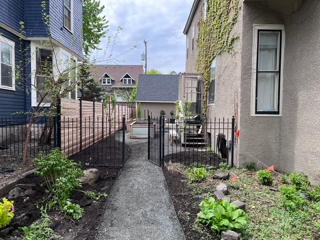 Backyard drainage and grading solution in Minneapolis with improved soil structure and defined landscape edges.